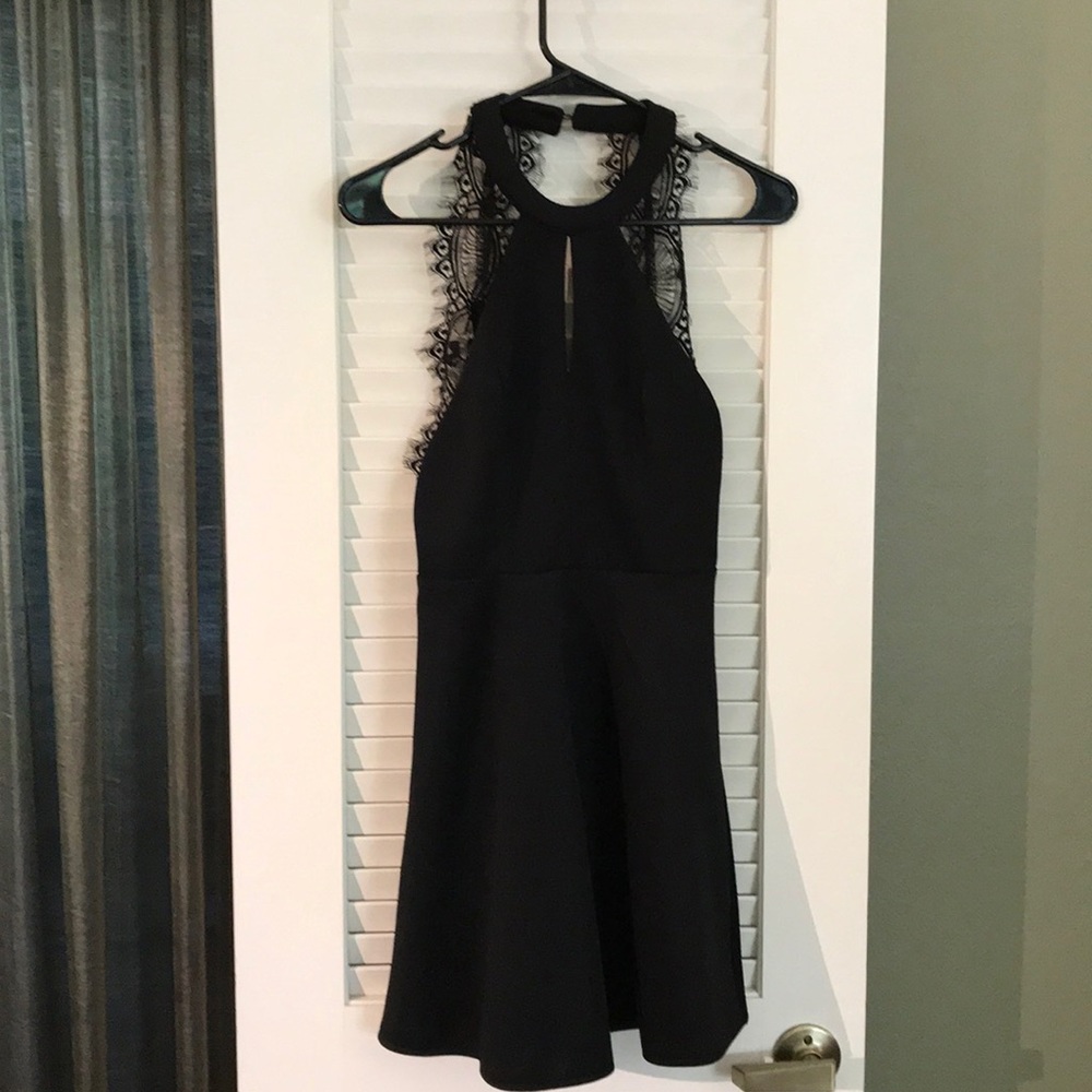 Little black dress with sexy lace back details.